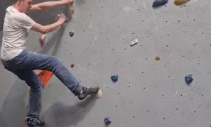 Boulderer Slips On A Difficult Climb