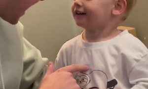 Kid learns the magic of Halloween