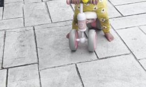 Brother Gives His Little Sister a Push