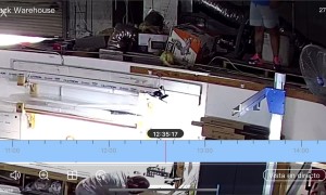 Warehouse Worker Drops Down