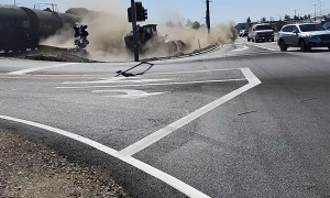 Train Collides With Stuck Semi-Truck's Trailer