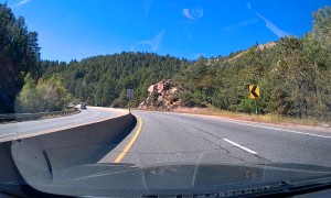 Narrowly Avoiding an SUV Making a U-Turn on a Busy Highway