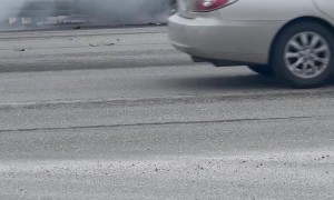 Smoke Billows From Truck