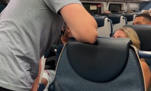 Woman on Train Accosts German Tourists