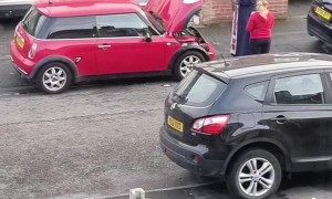 A Local Priest Cleanses A Car Of Demonic Influence