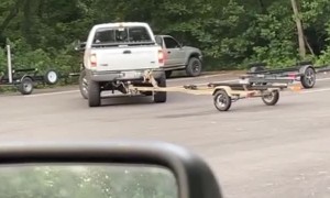 Oblivious Driver Turns Over Trailer