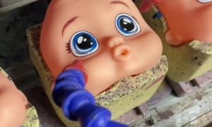 Doll Factory Stamps On Faces