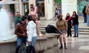 Man Slips After Fountain Dip