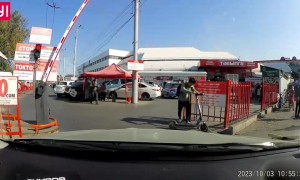 Scooter Rider Tries To Shoot The Gap