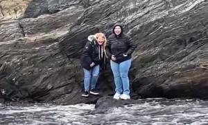 Tides Trap Women on Rock
