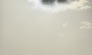 Solar Eclipse Seen Through Cloud