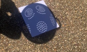 Eclipse And Pinhole Effect Create Crescent-Shaped Shadows