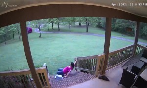 Woman Wipes Out on Steps Taking Out Trash