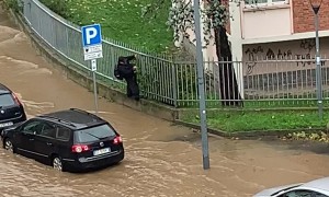 Pedestrian Stays Dry During a Flood