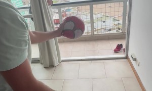 Soccer Ball Bounces Off Railing and Flies Back Into Room