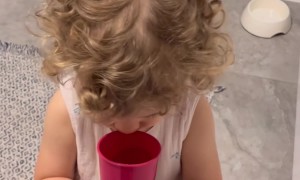 Girl Tries a Glass of Lime Juice