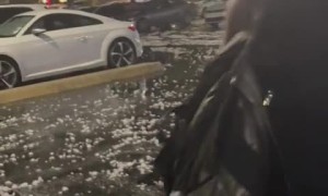 Extreme hailstorm absolutely destroys the windows on the car