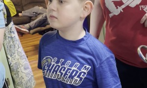 Boy Thinks Cooked Turkey Neck Is Something Else