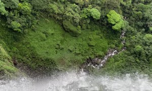 Couple Sit On Columbia's Highest Waterfall