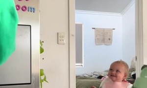 Baby girl's reaction to her parents hugging is too adorable 