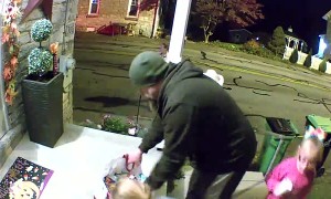 Man Helps Himself To Handfuls Of Candy