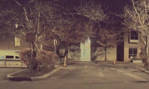 Random Guy Appears to Unplug Tesla and Flip Off Owner