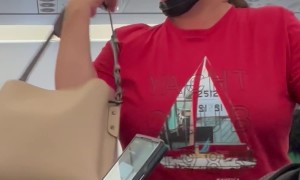 Woman Threatens to Urinate in Aisle  During Flight