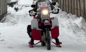 Test Driving a Motorcycle Snowmobile