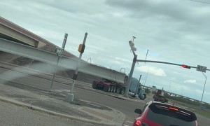 Truck Drivers Make An Impossible Turn