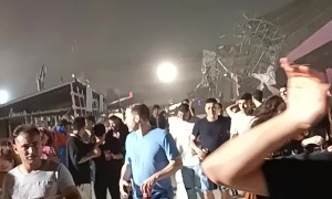 Storm Sends Pink Bear Flying Through Crowd of Fleeing Festival-Goers