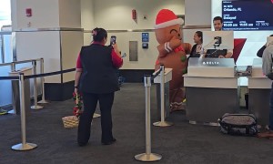Gingerbread Man Spreads Christmas Cheer In The Airport