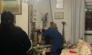 Grandpa Tries To Tend The Fire