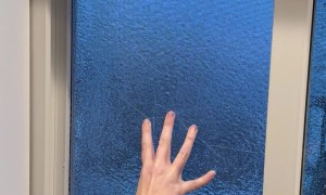 Ice Freezes Over Window Screen