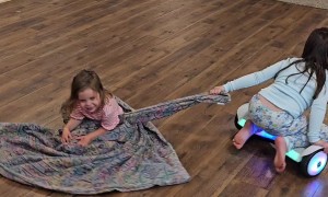 Sisters Take Hoverboard For a Spin