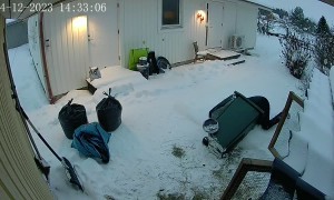Woman Gets Stuck in Garbage Bin