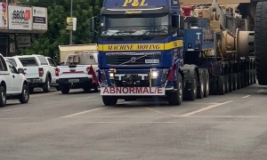 Mining Trucks Stop Traffic