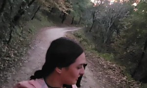 Woman Calmly Walks Away From Black Bear