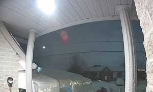 Woman Sighs in Defeat When Shoveling Snow