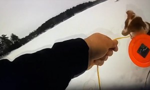 Dog helps police rescue owner from icy lake
