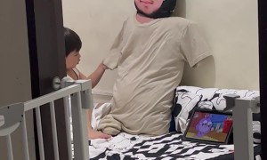 Boy Plays With Pillow Depicting Late Father