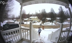 Icy Steps Cause Guy to Slide All the Way Down