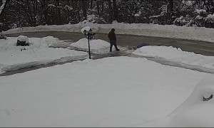 Man Slides Down Icy Driveway and Falls