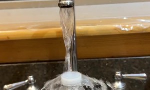 Laminar Flow Creates Water Bottle Waterfall