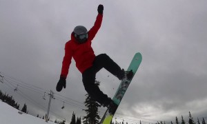 Snowboarder Overshoots The Jump