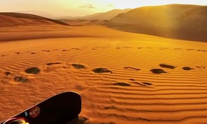 Sandboarding On The Dunes