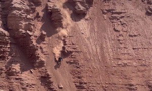 Riding Down A Steep Cliff Face