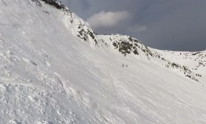 Snowboarder Catches an Edge and Tumbles Down Steep Slope