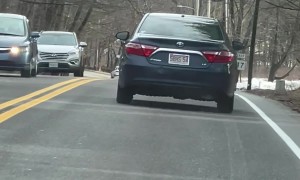 Swerving Car Crashes Into Parked Van