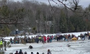 Snowmobiler Skims Water and Crashes on Icy Lake