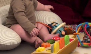 Baby Belly Laughs At Book